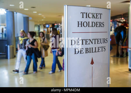 Toronto Canada,Bremner Boulevard,CN Tower,observation tower,telecomm antenna modern wonder,lobby,sign,ticket holders,English,French,bilingual,North Am Stock Photo