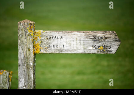 worn wooden direction sign for cursus and larkhill at stonehenge wiltshire england uk Stock Photo