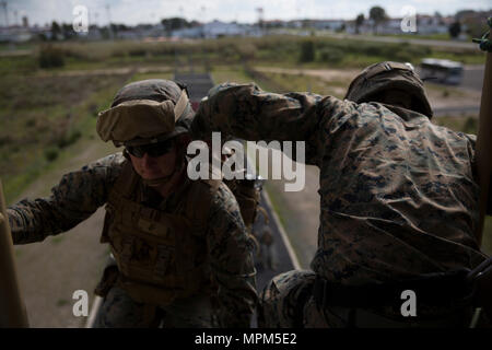 Marine Machine Gunner Fast Roping Lance Cpl. Skylar Brumbaugh, a machine gunner assigned to Special ...