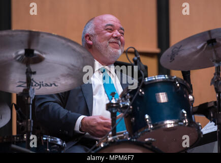 Peter Erskine, American jazz drummer, smiles after performing alongside the U.S. Air Force Band Airmen of Note at a Jazz Heritage Series concert in Alexandria, Va., March 23, 2017. Erskine is a renowned musician, having won two Grammy Awards and “Best Jazz Drummer of the Year” by Modern Drummer Magazine readers 10 times. He is one of many jazz icons who have participated in the series, which began in 1990. (U.S. Air Force photo by Senior Airman Jordyn Fetter) Stock Photo