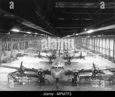C-54 maintenance line in the Douglas aircraft manufacturing facility at Tinker Air Force Base, Oklahoma,in the mid-1940s. Photo courtesy Tinker History Office. Stock Photo