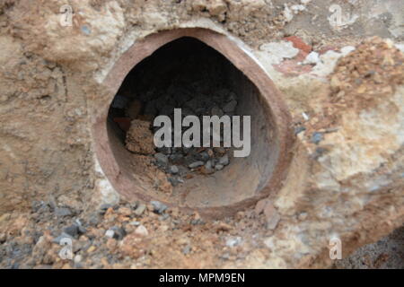 The sewer line upgrades at Fort Indiantown Gap are replacing old terra cotta pipes like these from the 1950s with new PVC pipes. (U.S. Army National Guard photo by Maj. Angela King-Sweigart) Stock Photo