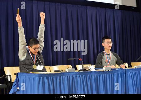 A student from the Chesapeake Math Program celebrates winning the Countdown Round of the Carderock Math Contest in West Bethesda, Maryland, on March 24, 2017. The contest tests speed, accuracy, and problem-solving skills in timed mathematics challenges. Participants engage in computational exercises that reinforce STEM education, promote critical thinking, and encourage competitive academic achievement. Stock Photo