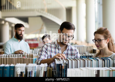 Young woman and man studying for an exam Stock Photo