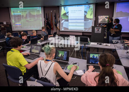 SSC Atlantic hosted the sixth Tri-County Dimension U competition at Naval Weapons Station Joint Base Charleston on 24 March 2017. Over 50 students from local school districts participated in educational activities focusing on science, technology, engineering, and math (STEM). SSC Atlantic’s outreach programs aim to develop future technical talent for military and civilian careers by providing hands-on competitions, interactive learning, problem-solving challenges, and demonstrations of advanced naval systems. Stock Photo