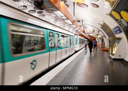 Passengers people and underground train on the platform at Pont-Neuf metro station in Paris France Europe  KATHY DEWITT Stock Photo