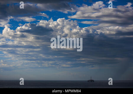 Drilling Platform On Open Sea With Clouds Stock Photo