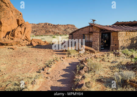 Visitor's center built out of rocks at Twyfelfontein rock engravings Stock Photo