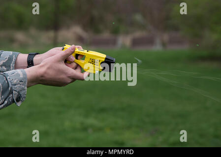 Staff Sgt. Corey Ormsby, 375th Security Forces Squadron, fires a