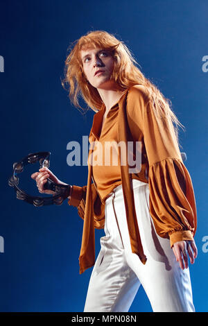 Florence + The Machine (Florence Welch) performing live in Newcastle, UK. Florence and the Machine live, Florence Welch onstage. Stock Photo