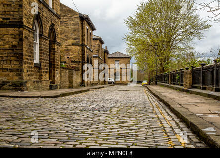 Cobbled streets of Saltaire village in West Yorkshire. Saltaire is a UNESCO designated World Heritage Site. Stock Photo