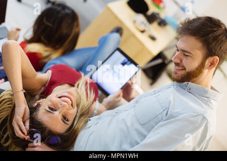 Happy casual coworkers in the office Stock Photo