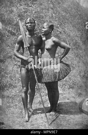 A Mulolo (Congo) warrior and his wife from the central Congo regions, 1902. Artist: Unknown. Stock Photo