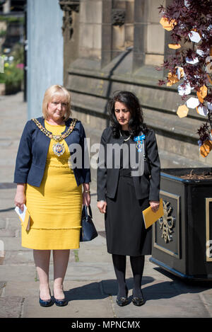 The Lord Mayor of Manchester Councillor June Hitchen waits outside Manchester Cathedral after the national service of commemoration remembering the victims of the Arena bomb attack in Manchester, Britain, on May 22, 2018. Prince William and British Prime Minister Theresa May joined other politicians, as well as family members of those killed, and first responders to the scene of the terror attack, whilst thousands of people gathered in Manchester Tuesday on the first anniversary of a terror attack in the city which left 22 people dead. Stock Photo