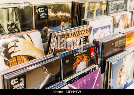 BUCHAREST, ROMANIA - APRIL 22, 2018: Vinyl Record Cases Of Famous Music Bands For Sale In Music Store Stock Photo