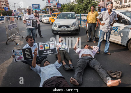 Kolkata, India. 24th May, 2018. People protest against recent price hike of fuel in Kolkata, India, on May 24, 2018. According to a rough estimate, India has the highest retail prices of petrol and diesel among South Asian nations as taxes account for half of the fuel-pump rates. Credit: Tumpa Mondal/Xinhua/Alamy Live News Stock Photo