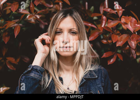 Portrait of young woman in autumn Stock Photo