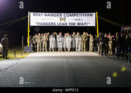 U.S. Army Rangers begin the 34th annual David E. Grange Jr. Best Ranger Competition at Ft. Benning, Ga., Apr. 7, 2017. The Best Ranger competition is a three-day event consisting of challenges to test competitor's physical, mental, and technical capabilities, and places the military's best two-man Ranger teams against each other to compete for the title of Best Ranger. (U.S. Army photo by Staff Sgt. Justin P. Morelli / Released) Stock Photo