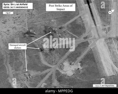 Battle damage assessment image of Shayrat Airfield, Syria,  following U.S. Tomahawk Land Attack Missile strikes April 7, 2017 from the  USS Ross (DDG 71) and USS Porter (DDG 78), Arleigh Burke-class  guided-missile destroyers. The United States fired Tomahawk missiles into  Syria in retaliation for the regime of Bashar Assad using nerve agents to  attack his own people. Stock Photo