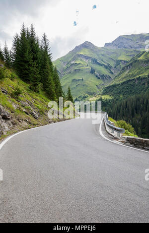 Austria, Vorarlberg, winding narrow alpine road from Warth to Lech, Lech valley Stock Photo