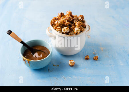 Caramel popcorn in bowl Stock Photo
