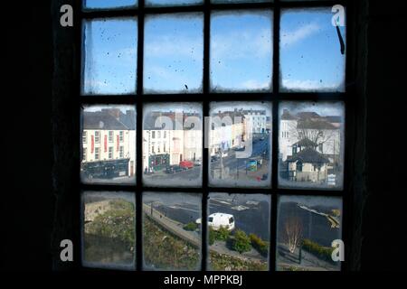 View of street from a window inside Cahir Castle, Town of Cahir, County Tipperary, Ireland Stock Photo