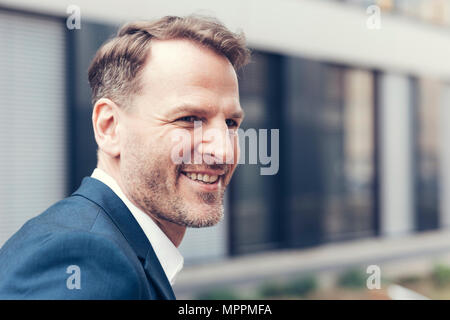 Portrait of smiling businessman Stock Photo