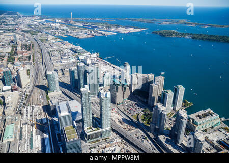 Toronto Canada,CN Tower,Sky Pod,window view southeast,Lake Ontario,harbour,harbourfront,waterfront,Gardiner Expressway,high rise skyscraper skyscraper Stock Photo
