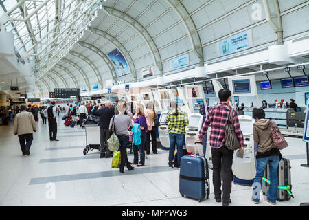 Toronto Canada,Lester B. Pearson International Airport,YYZ,aviation,terminal,ticket counter,self service check in kiosk,passenger passengers rider rid Stock Photo