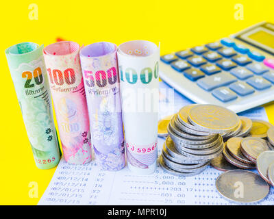 abstract money saving. Stack of coins, calculator, book bank and