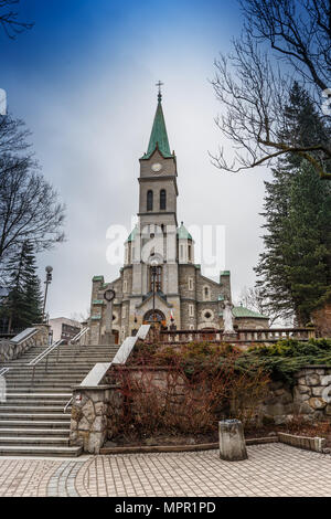 Stone church with a bell tower in the city of Zakopane in Poland Stock Photo