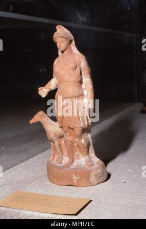 Greek Terracotta, Artemis Bendis with a small hunting dog, c350BC-c300 BC Artist: Unknown. Stock Photo