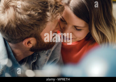 Affectionate couple cuddling at home Stock Photo