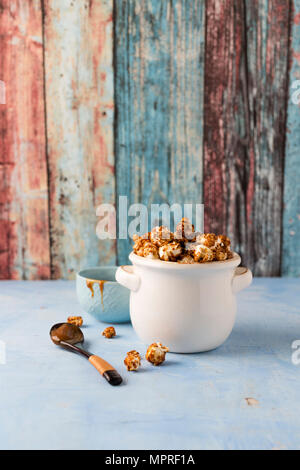 Caramel popcorn in bowl Stock Photo