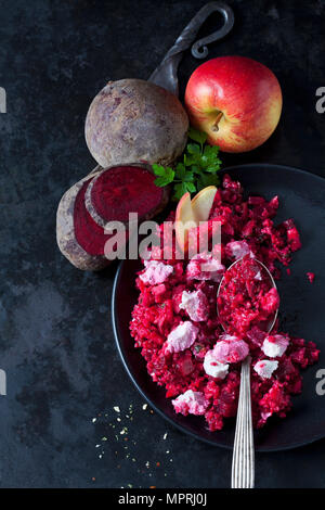 Beetroot salad with durum wheat semolina, apple and soft goat cheese Stock Photo