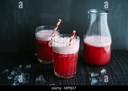 Drink: Switchel, drink with ginger, apple vinegar, coconut water, cranberry juice, lemon, cruched ice, honey Stock Photo