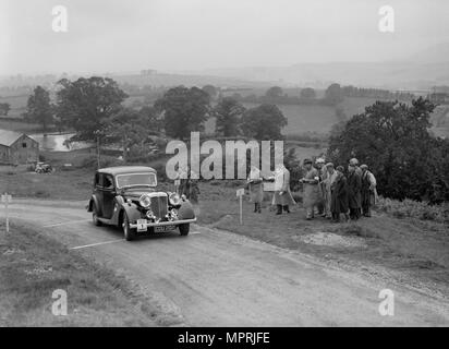 Daimler Light Straight 8 saloon of WH Smith competing in the South Wales Auto Club Welsh Rally, 1937 Artist: Bill Brunell. Stock Photo