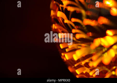 Shining light bulb with firework effect. Abstract background, closeup photo Stock Photo
