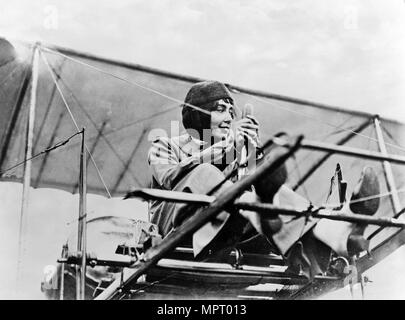 Hélène Dutrieu at the controls of her plane, c.1911. Stock Photo
