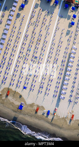 Bird's eye view of colored umbrella in a beach in italy, Tuscany,Viareggio Stock Photo