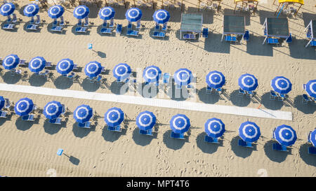 Bird's eye view of colored umbrella in a beach in italy, Tuscany,Viareggio Stock Photo