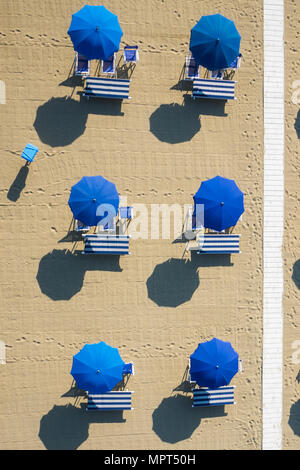 Bird's eye view of colored umbrella in a beach in italy, Tuscany,Viareggio Stock Photo