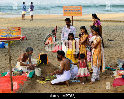 VARKALA, KERALA, INDIA - 18 MARCH 2015: Traditional morning Puja  in the holy place on Varkali beaches in the Kerala state in India Stock Photo