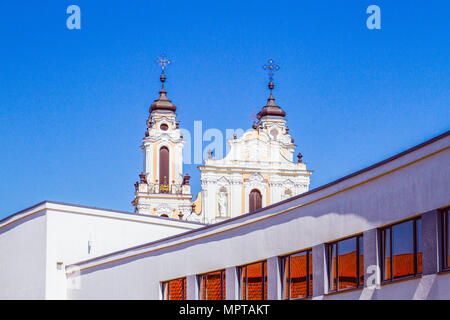Vilnius city view. St. Catherine church near Vilnius Salomeja Neris gymnasium school in Vilnius, Lithuania Stock Photo
