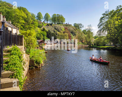 Rowing on the River Nidd in Spring at Knaresborough North Yorkshire England Stock Photo