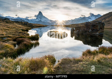 sunset at Matterhorn with reflection in Stellilake in the late afternoon Stock Photo