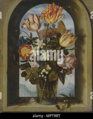 tulips, moss-roses, lily-of-the-valley and other flowers in a glass beaker set in an arched stone wi Stock Photo
