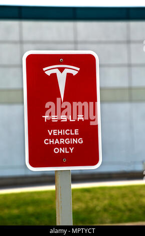 Sign for Tesla electric vehicle Supercharging Station Stock Photo