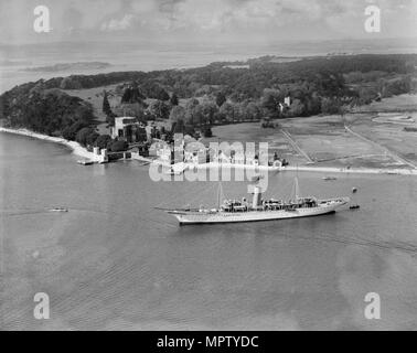 Montague Grahame-White's steam yacht 'Alacrity' and Brownsea Island, Dorset, from the east, 1933. Artist: Aerofilms. Stock Photo