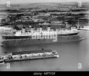 The original RMS 'Mauretania' in the floating dry dock, Southampton, Hampshire, 1933. Artist: Aerofilms. Stock Photo